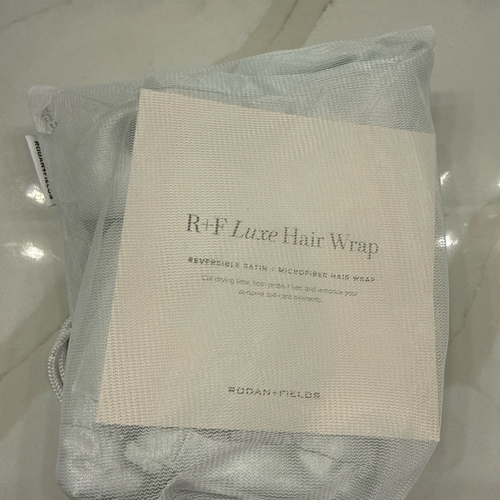 Rodan + Fields Luxe Hair Wrap in Light Silver/White